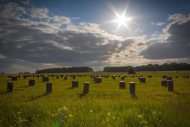 Concrete markers set where prehistoric posts once stood in the Avebury landscape