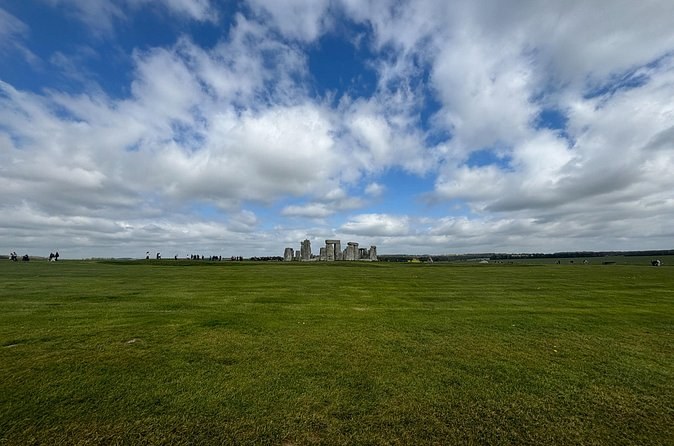 Stonehenge seen at a distance across Salisbury Plain